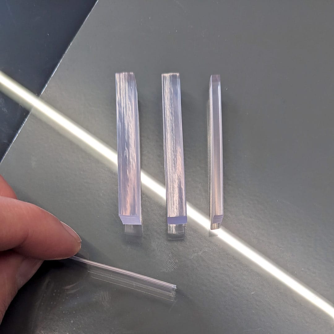 Polycarbonate setting blocks for mirror installation
