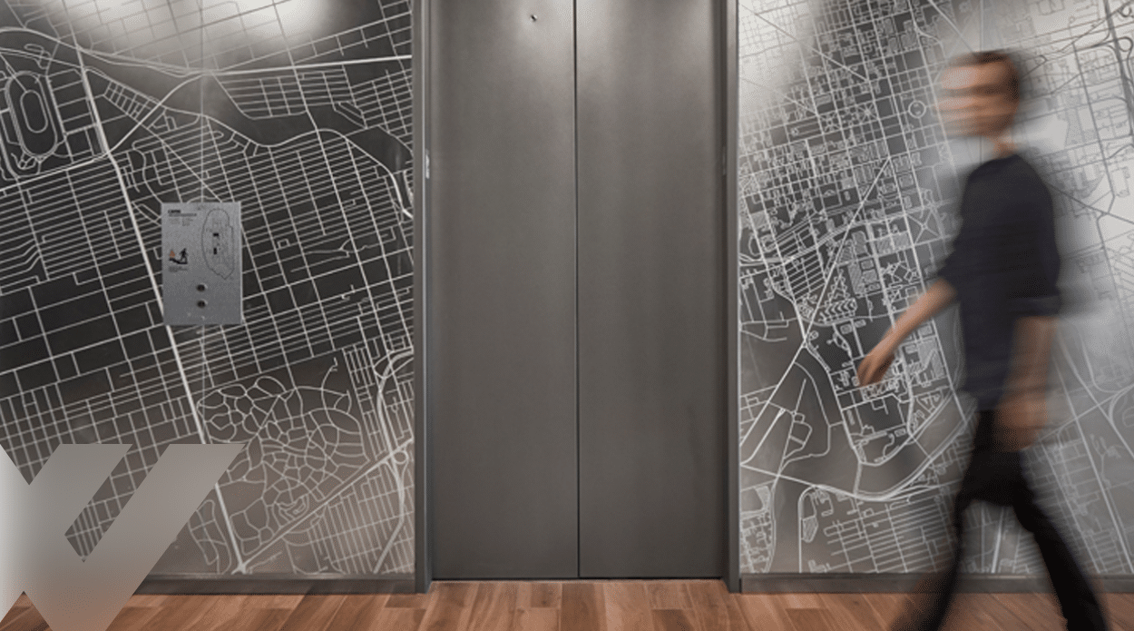 CBRE Indianapolis with Satinlite acid etched glass, digitally printed and laminated to grey mirror